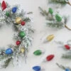 Raz 22" Light Bulb And Snowy Pine Christmas Wreath W4206875 -Holiday Decorations w4206875 edit 07234.1651515357